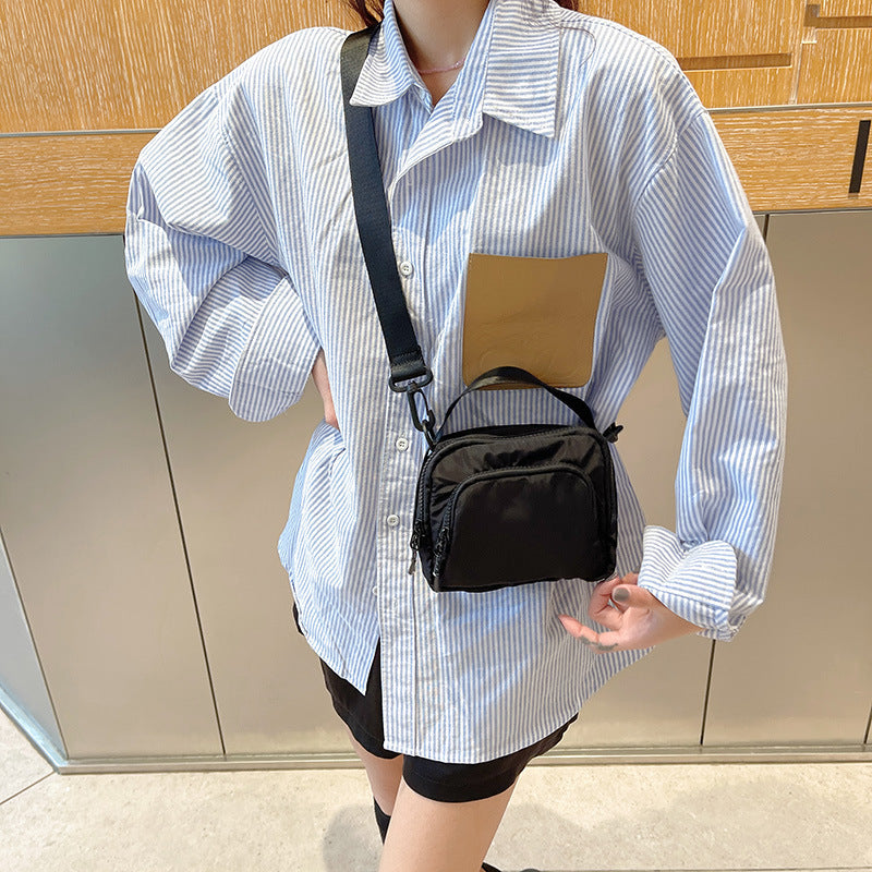 2025 summer and autumn new shoulder messenger bag ins casual hanging bag portable lightweight Oxford cloth mini bag trendy bag