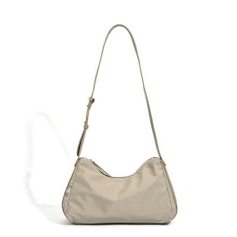 Niche women's bags Japan and Korea 2025 new textured nylon shoulder messenger bag autumn and winter splicing commuter underarm handbag