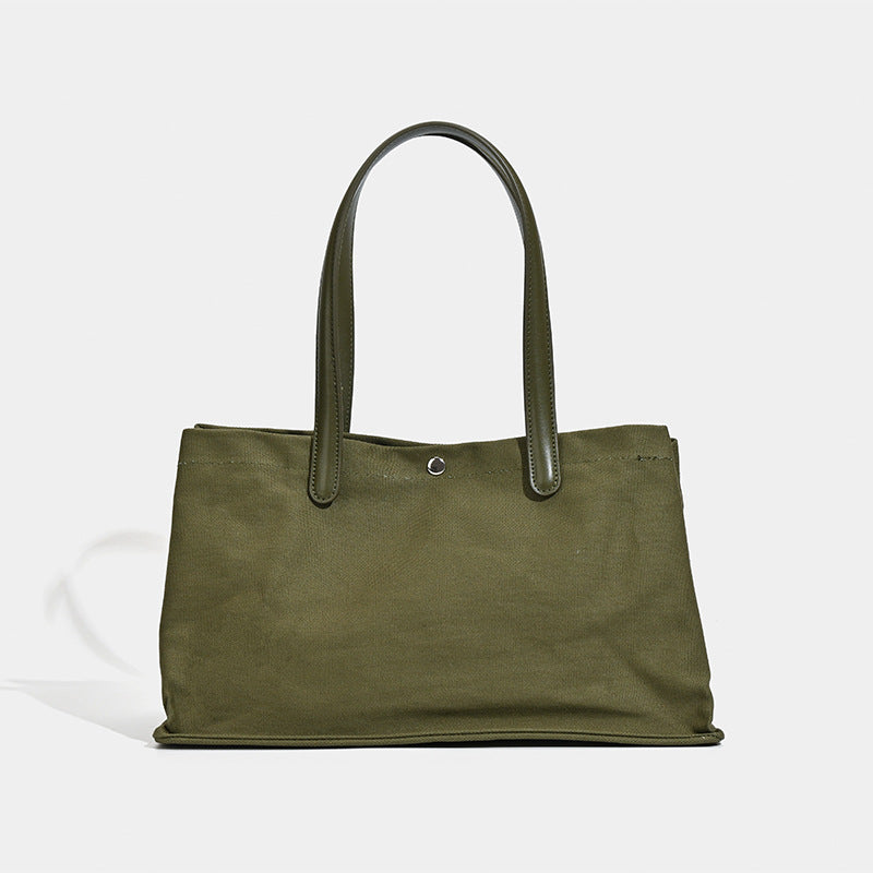 Niche design French trendy luxury leather splicing canvas large-capacity tote bag 2025 new commuter handbag