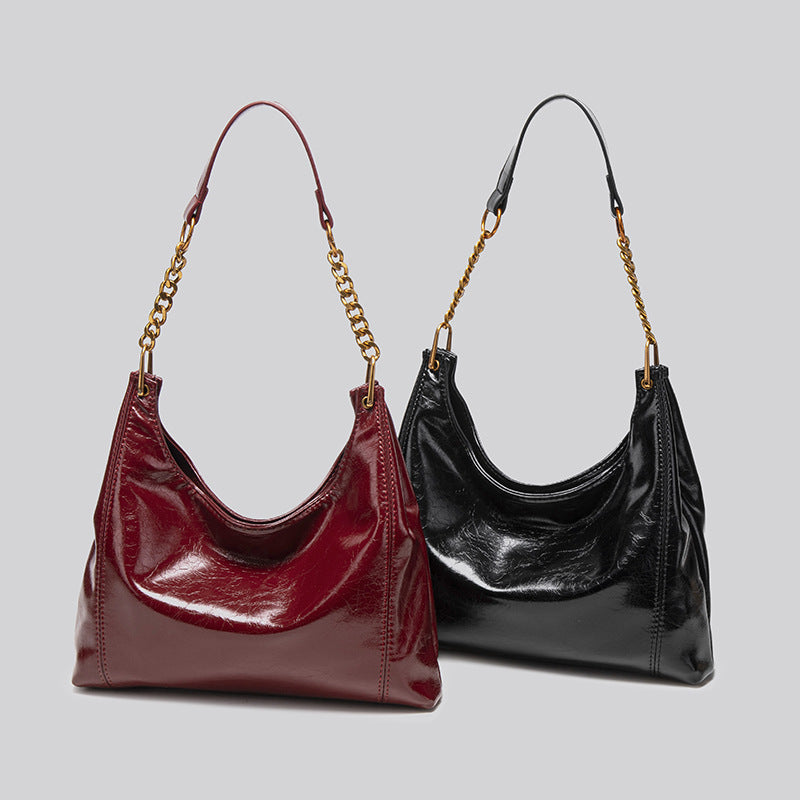 Retro oil wax pitot bag women's 2025 new super fire high sense light luxury large capacity underarm messenger bag bag