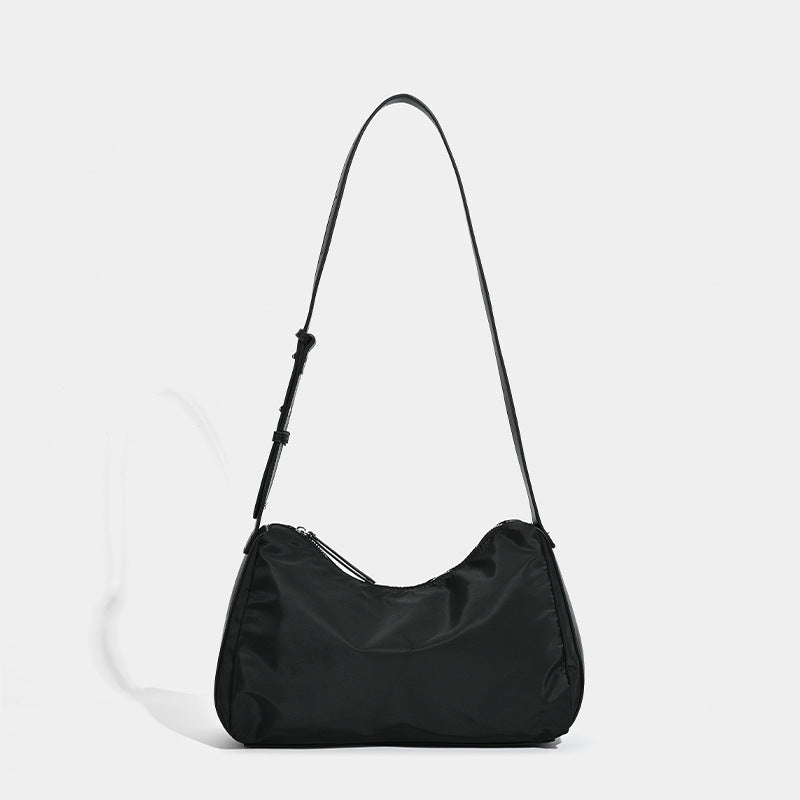 Niche women's bags Japan and Korea 2025 new textured nylon shoulder messenger bag autumn and winter splicing commuter underarm handbag