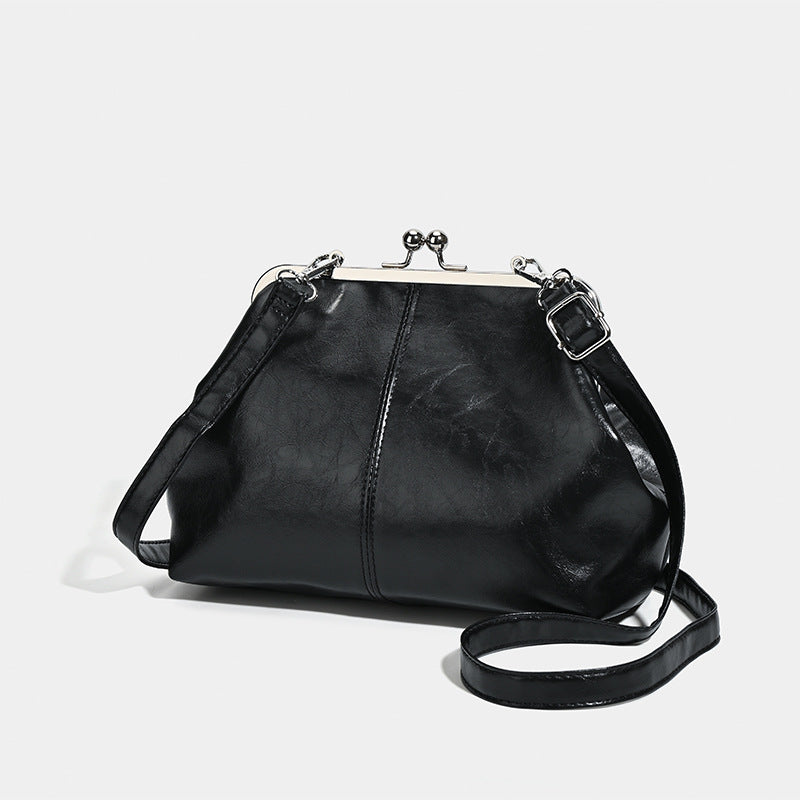 Japan and South Korea cross-border solid color clip bag fashionable new versatile commuter handbag bucket bag shoulder messenger bag