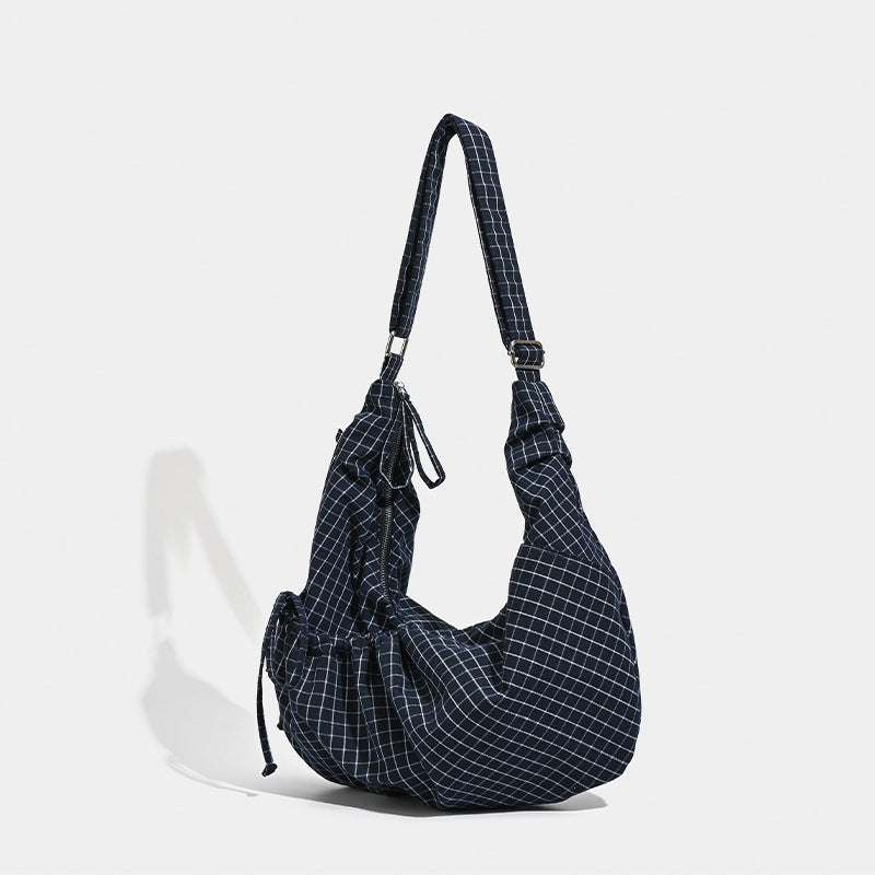 2025 Korean ins Lazy Wind Folded Drawstring Canvas Bag Versatile Commuter Large Capacity One Shoulder Oblique Span Dumpling Bag