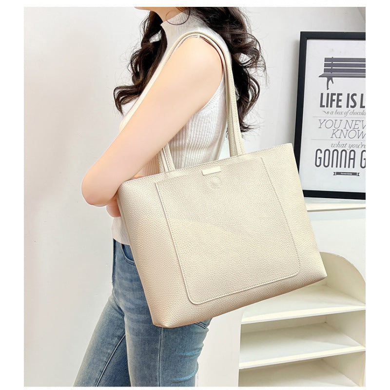 Large capacity bag women 2025 summer and autumn simple mother middle-aged new trendy commuter tote bag versatile shoulder bag
