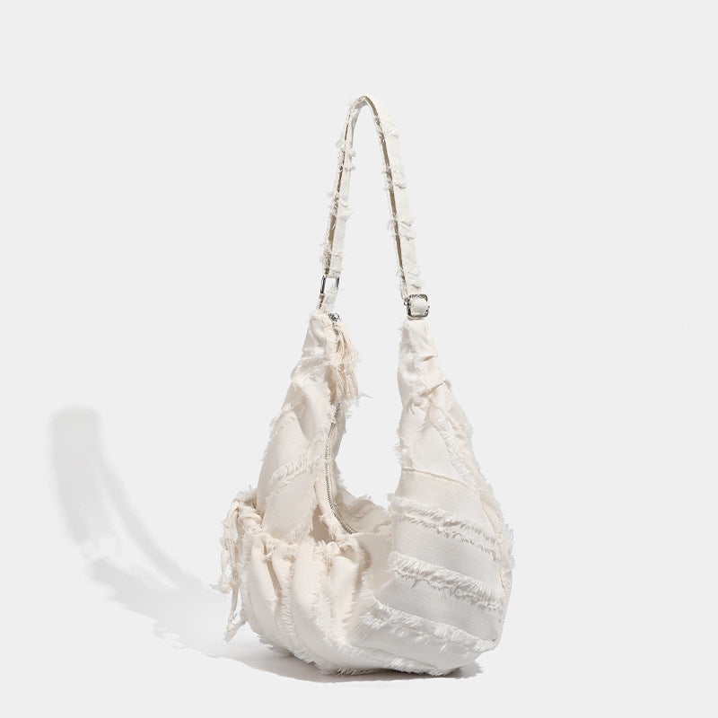 2025 Korean ins Lazy Wind Folded Drawstring Canvas Bag Versatile Commuter Large Capacity One Shoulder Oblique Span Dumpling Bag