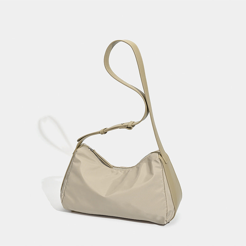 Niche women's bags Japan and Korea 2025 new textured nylon shoulder messenger bag autumn and winter splicing commuter underarm handbag