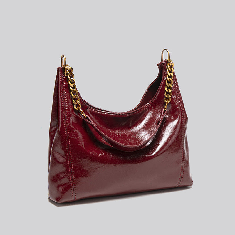 Retro oil wax pitot bag women's 2025 new super fire high sense light luxury large capacity underarm messenger bag bag