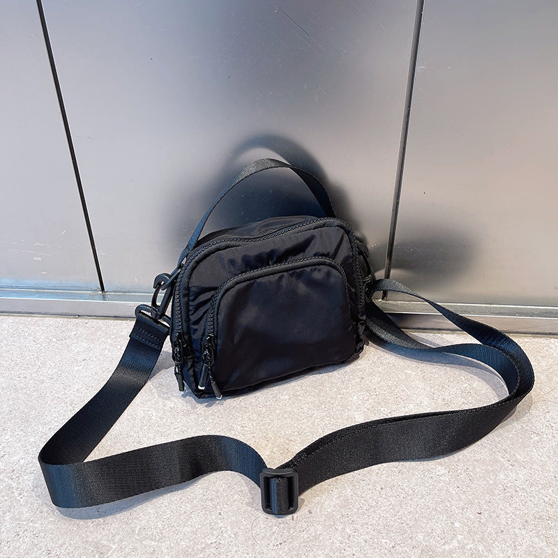 2025 summer and autumn new shoulder messenger bag ins casual hanging bag portable lightweight Oxford cloth mini bag trendy bag