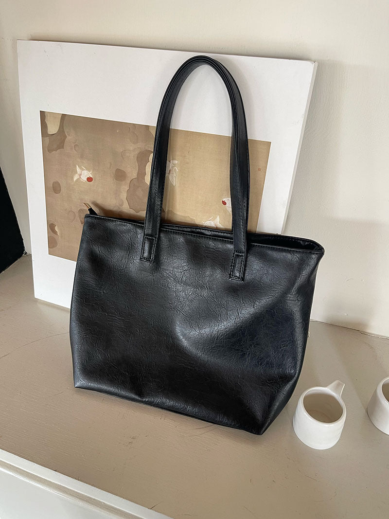 Casual shoulder bag women's 2024 new work and class commuting soft leather bag large capacity simple tote big bag