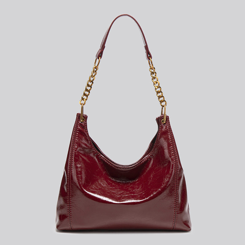 Retro oil wax pitot bag women's 2025 new super fire high sense light luxury large capacity underarm messenger bag bag