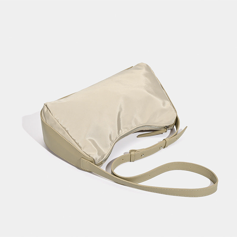 Niche women's bags Japan and Korea 2025 new textured nylon shoulder messenger bag autumn and winter splicing commuter underarm handbag