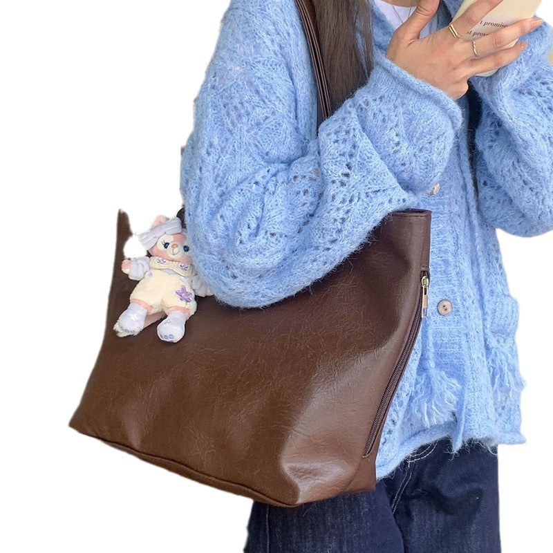 Casual shoulder bag women's 2024 new work and class commuting soft leather bag large capacity simple tote big bag