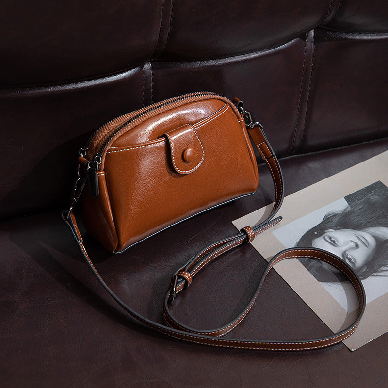 Retro Oil Wax Crossbody Bag – Stylish & Compact
