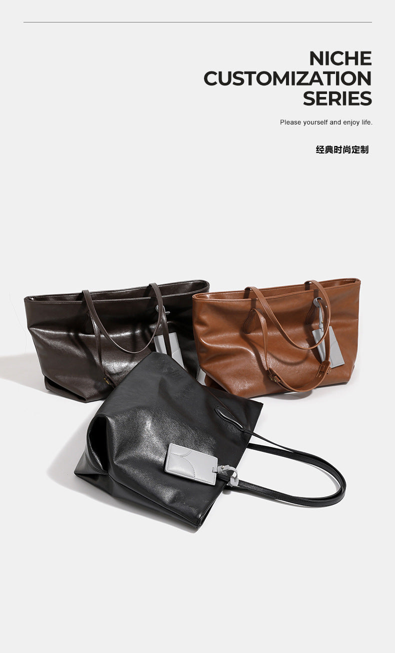 Cross-border large-capacity soft leather texture tote bag women's 2025 autumn and winter new commuter shoulder bag big bag tide