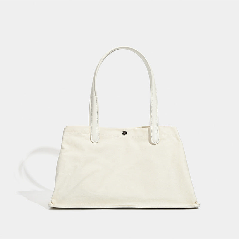 Niche design French trendy luxury leather splicing canvas large-capacity tote bag 2025 new commuter handbag