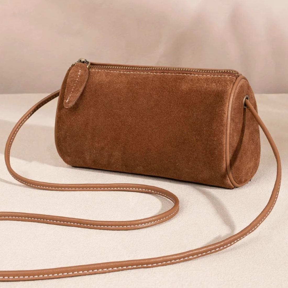 2025 autumn and winter new retro suede cylinder bag matte bag single shoulder oblique span women's bag small round bag mobile phone bag