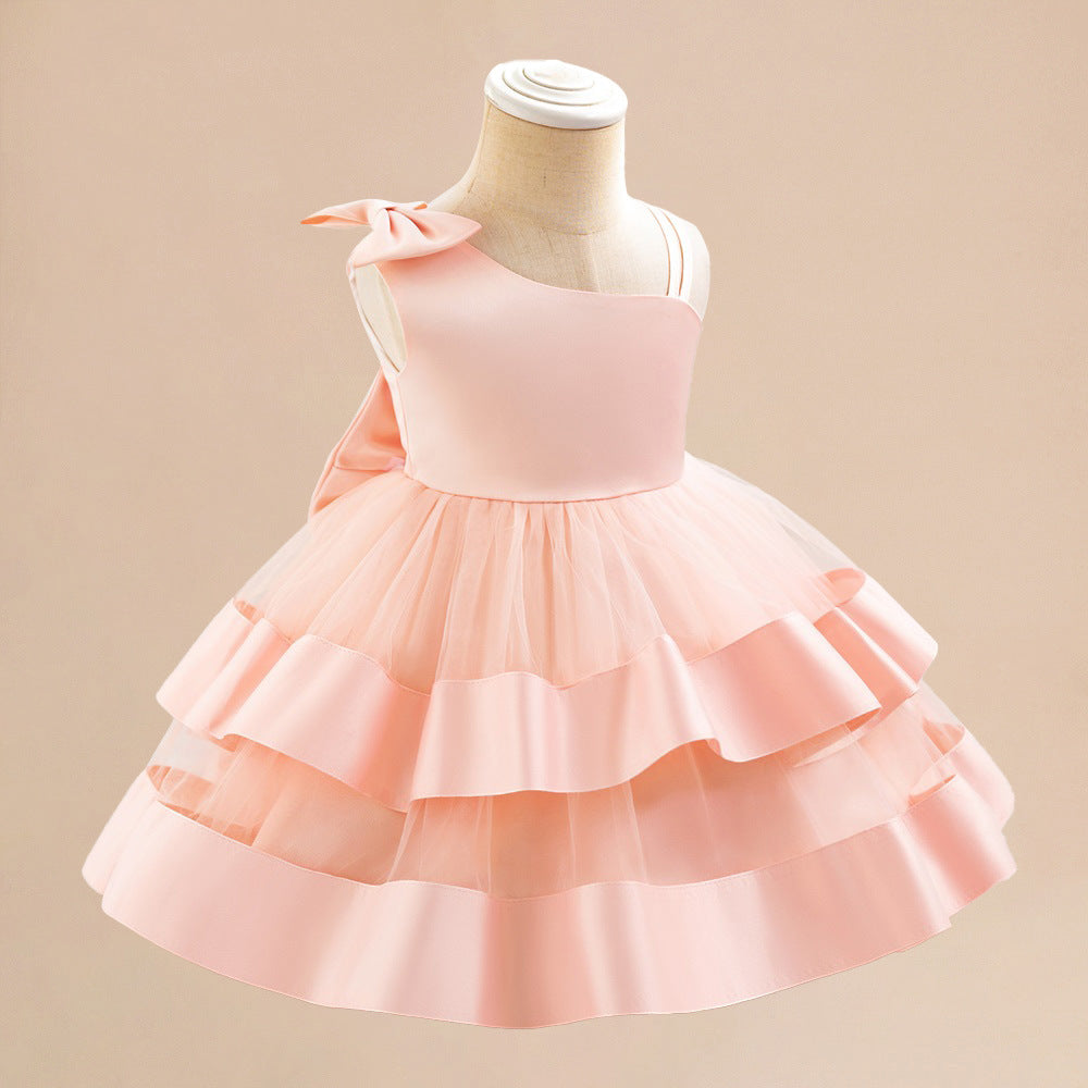 Summer children's dress slanted shoulder satin mesh splicing children's dress back big bow fluffy princess dress spot