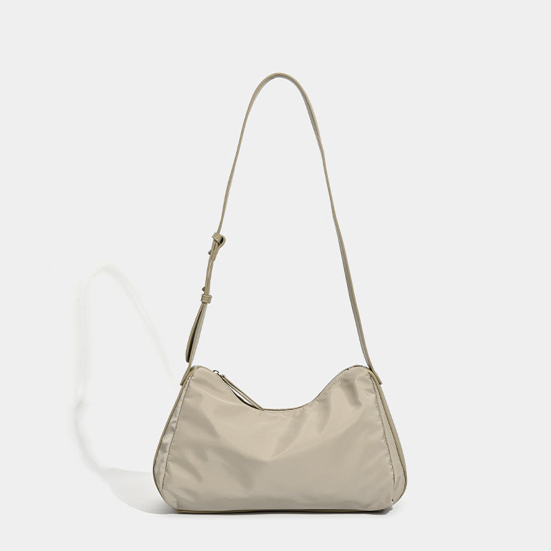 Niche women's bags Japan and Korea 2025 new textured nylon shoulder messenger bag autumn and winter splicing commuter underarm handbag