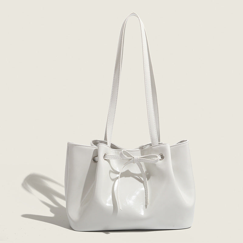 Korean version ins dumpling bag women's autumn and winter bow drawstring bucket bag bag fashionable versatile portable shoulder armpit bag