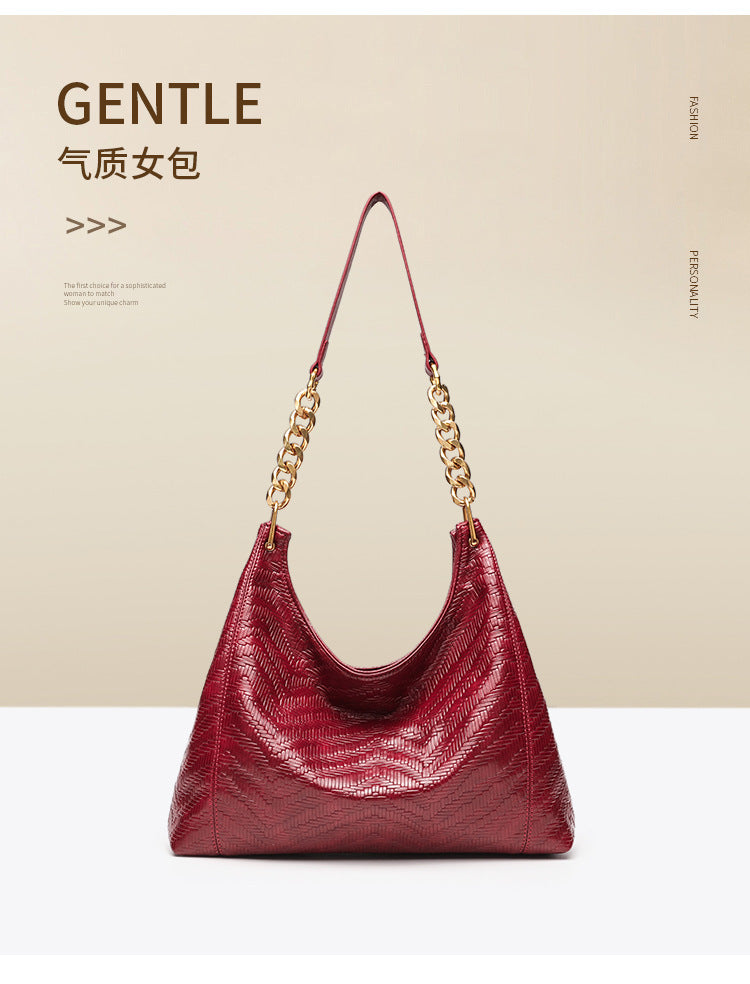 Large-capacity commuter women's bags, woven new tote bags, autumn and winter high-end sense niche retro messenger single shoulder armpit bags