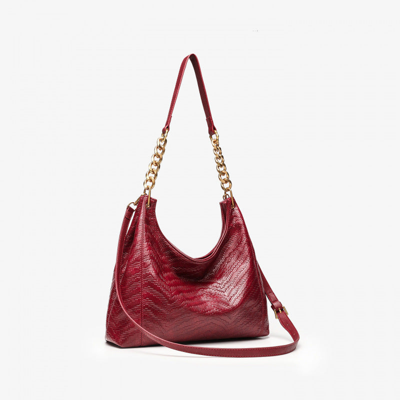 Large-capacity commuter women's bags, woven new tote bags, autumn and winter high-end sense niche retro messenger single shoulder armpit bags