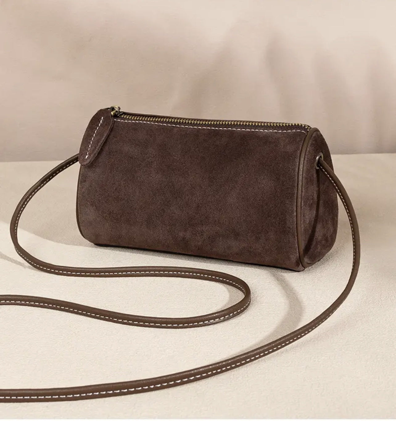 2025 autumn and winter new retro suede cylinder bag matte bag single shoulder oblique span women's bag small round bag mobile phone bag