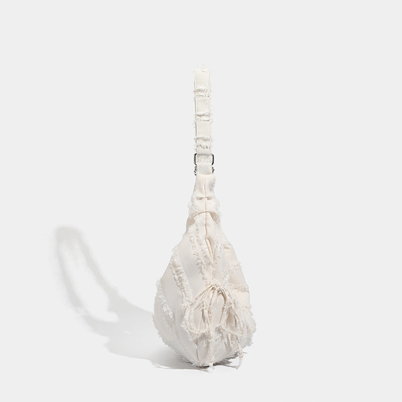 2025 Korean ins Lazy Wind Folded Drawstring Canvas Bag Versatile Commuter Large Capacity One Shoulder Oblique Span Dumpling Bag