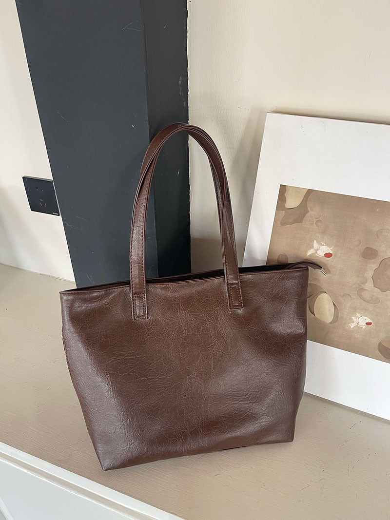 Casual shoulder bag women's 2024 new work and class commuting soft leather bag large capacity simple tote big bag