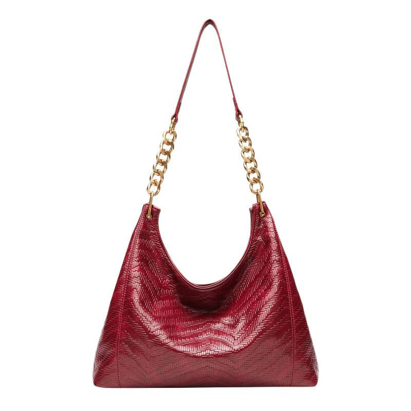 Large-capacity commuter women's bags, woven new tote bags, autumn and winter high-end sense niche retro messenger single shoulder armpit bags