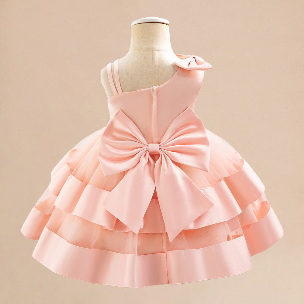 Summer children's dress slanted shoulder satin mesh splicing children's dress back big bow fluffy princess dress spot